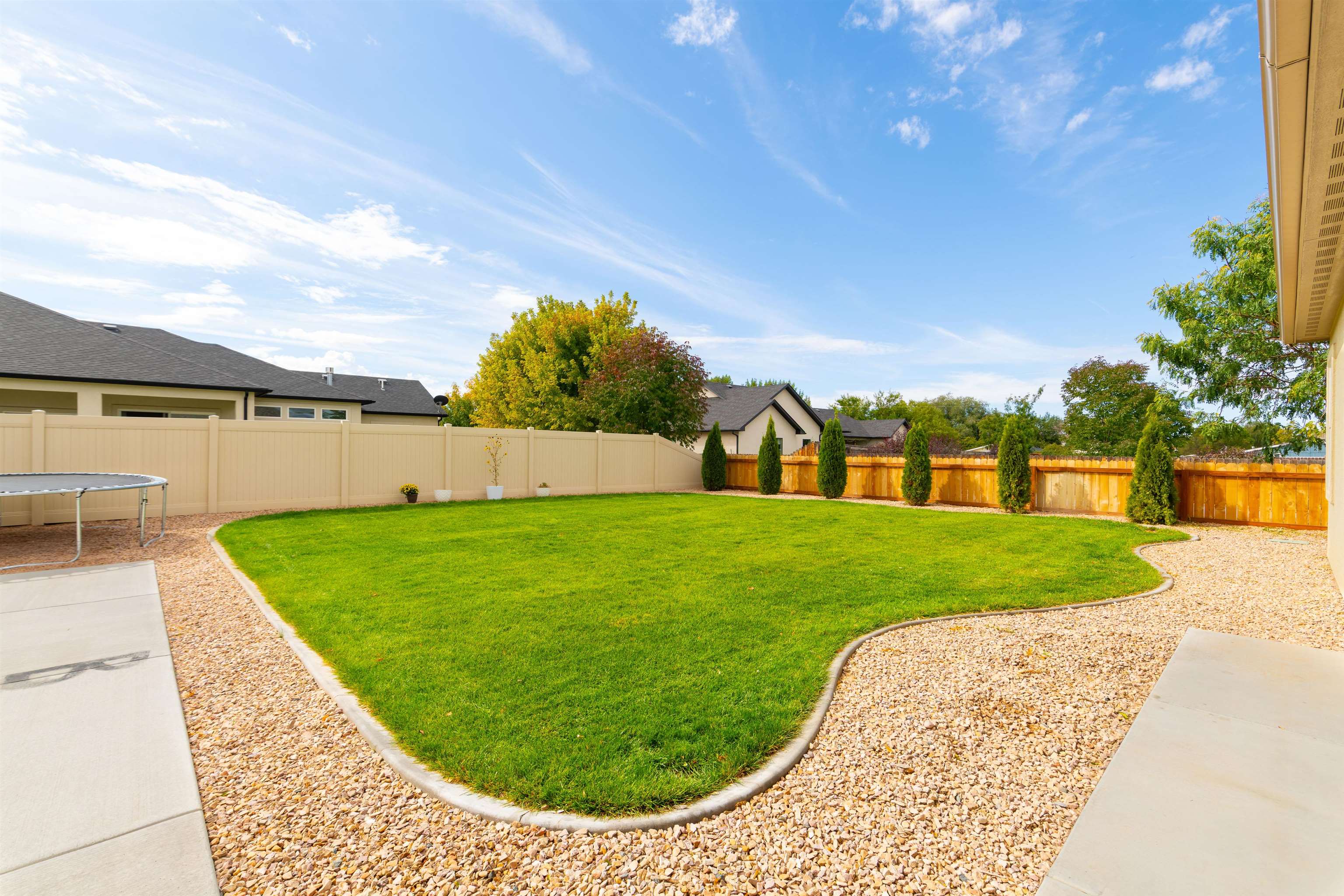1518 Myers Lane Fruita, CO 81521 - Photo 28 of 39 a view of a swimming pool with a yard