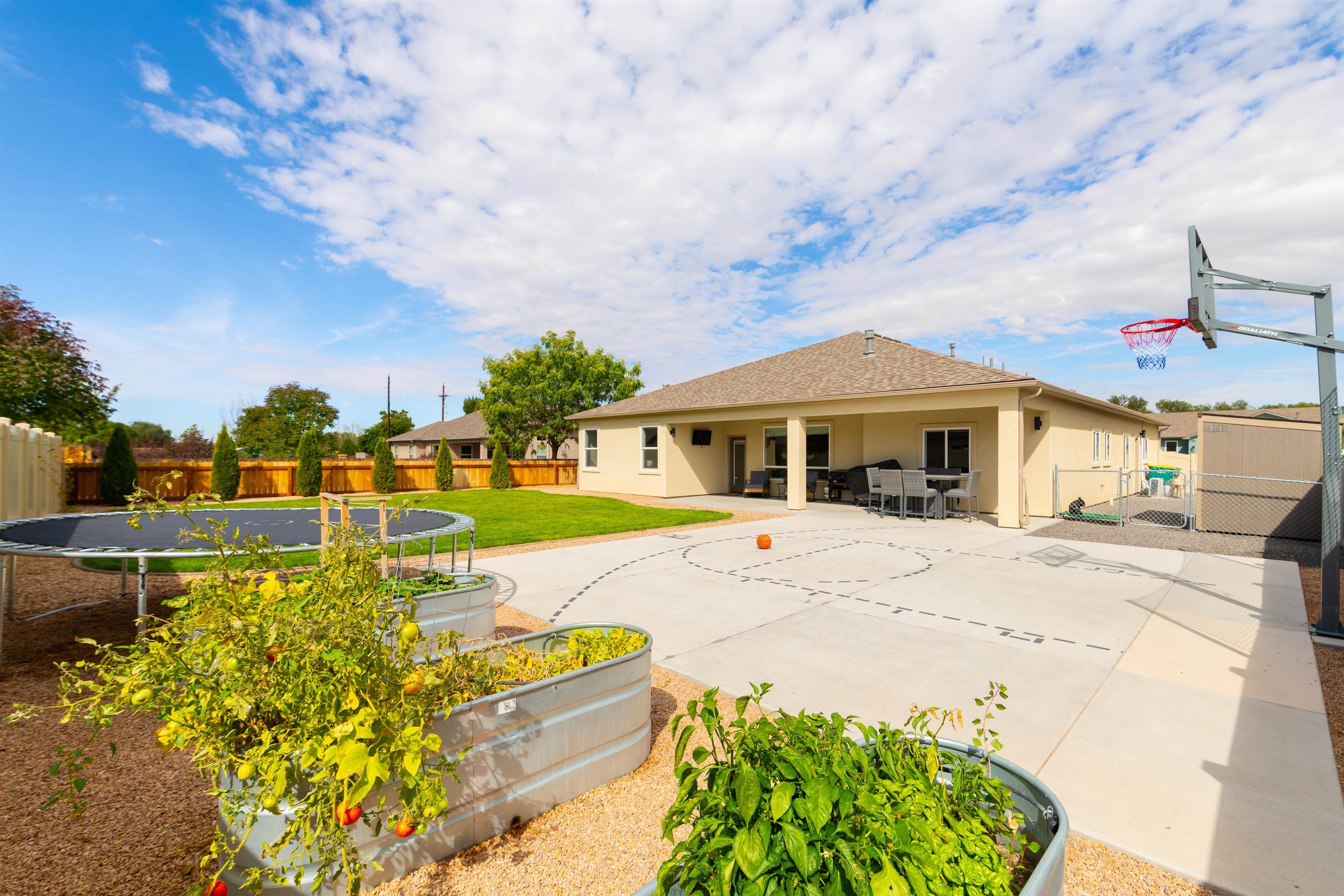 1518 Myers Lane Fruita, CO 81521 - Photo 31 of 39 a front view of a house with swimming pool