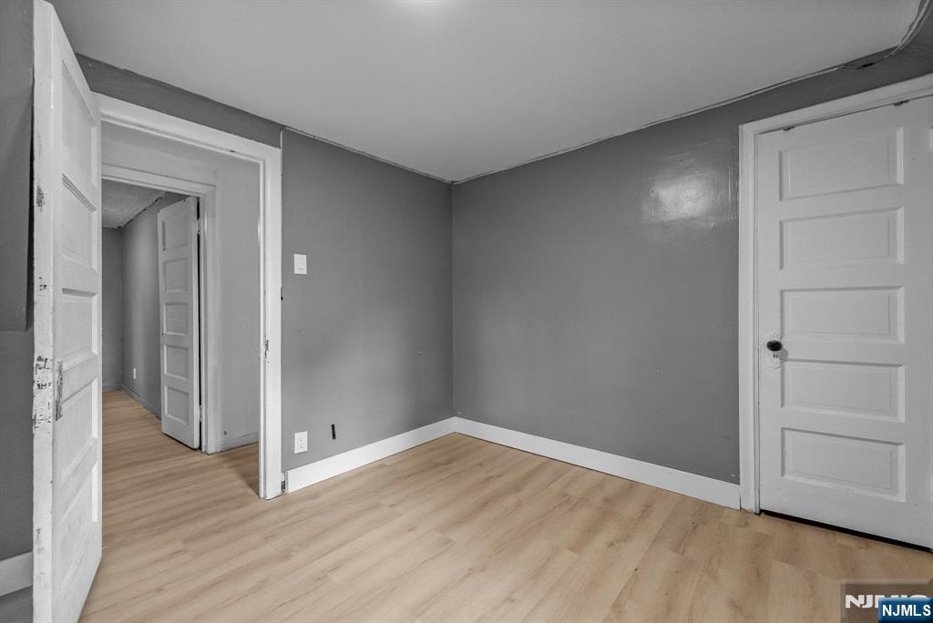 193 Fort Lee Road Teaneck, NJ 07666 - Photo 10 of 13 wooden floor in an empty room