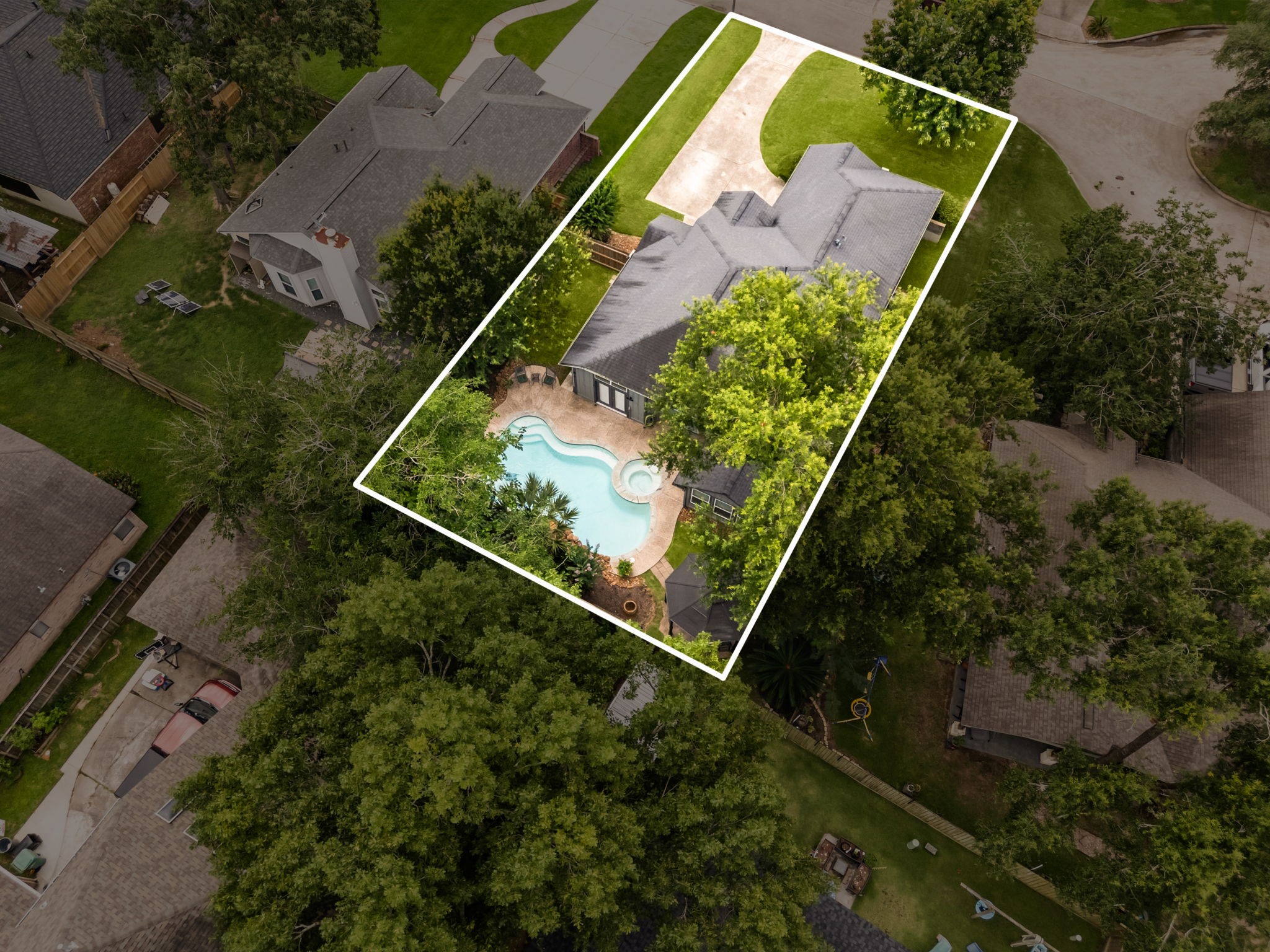1915 Mercoal Drive Spring, TX 77386 - Photo 44 of 50 Drone image with approximate lot lines illustrating the property’s size and configuration.