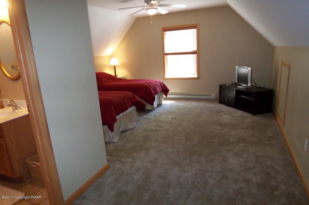 19 Brier Crest Road Blakeslee, PA 18610 - Photo 14 of 26 L SHAPED BEDROOM ON UPPER LEVEL