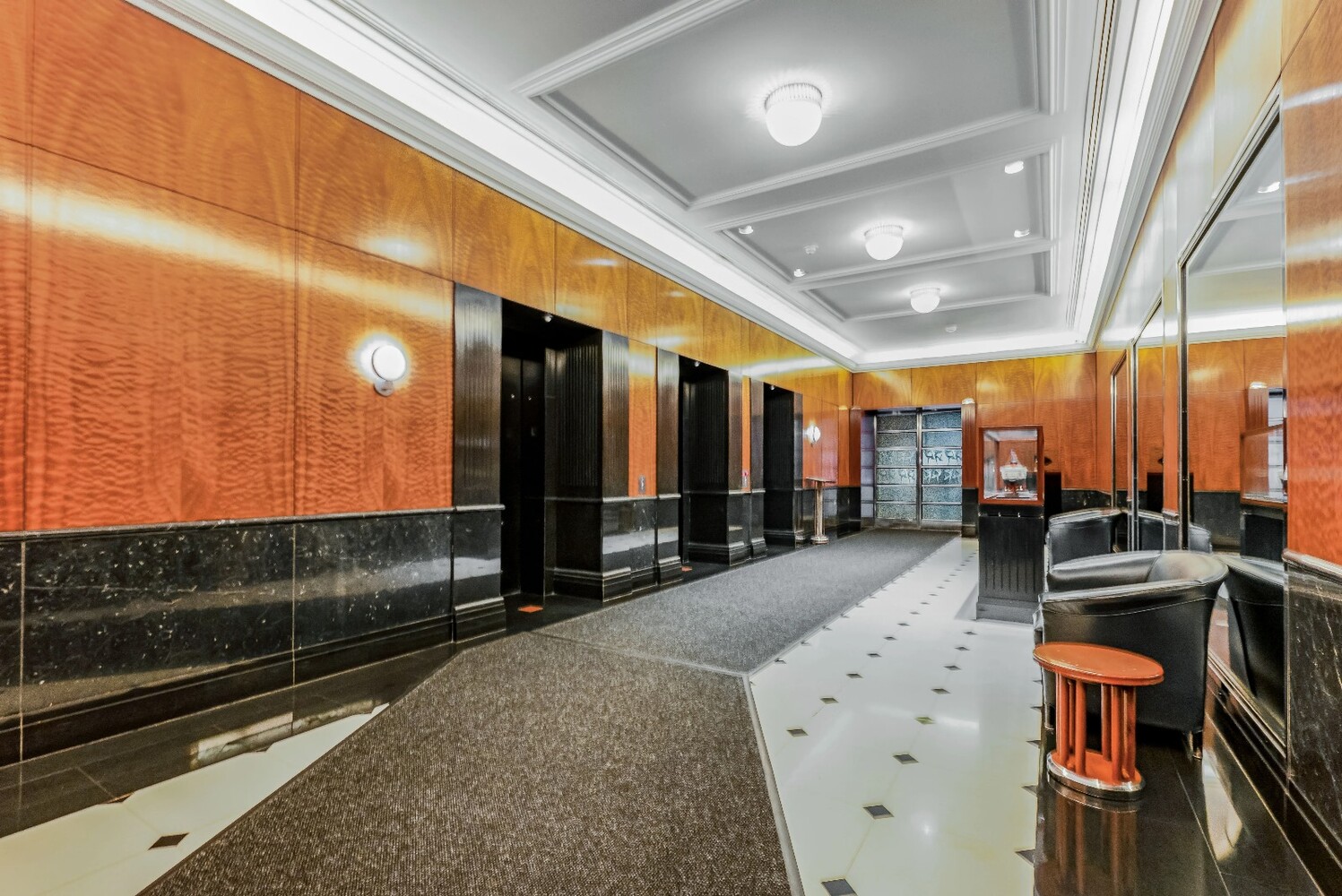 146 West 57th Street, Unit 34A Manhattan, NY 10019 - Photo 11 of 15 a view of a lobby with gym equipment