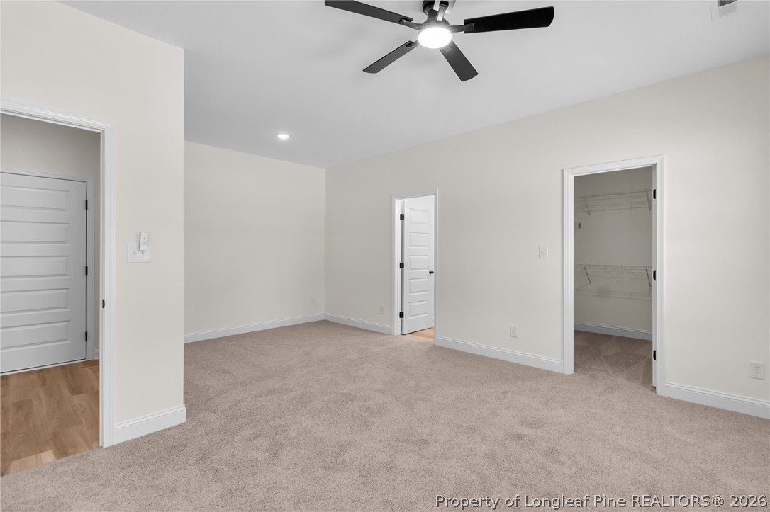 131 Merle Road Pinebluff, NC 28373 - Photo 17 of 33 a view of a room with a ceiling fan