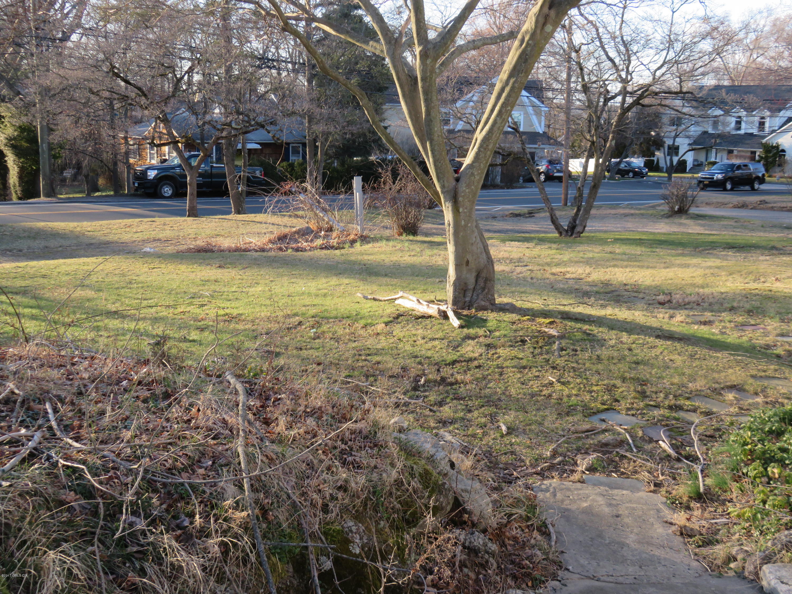 51 Sheep Hill Road Riverside, CT 06878 - Photo 4 of 5 a view of a yard with swimming pool