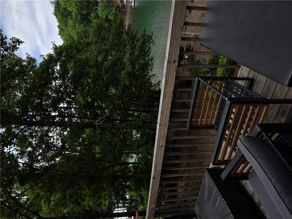 214 Berwick Court Seneca, SC 29672 - Photo 35 of 39 This tranquil outdoor space offers expansive water views from a private wooden deck.