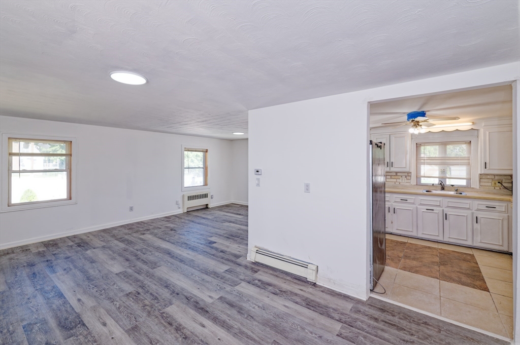 1 Rockland Rd Court Auburn, MA 01501 - Photo 8 of 38 an empty room with wooden floor and window