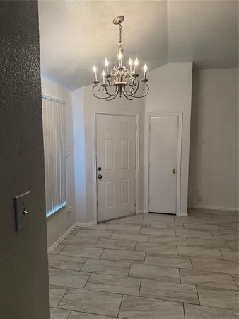 a view of a chandelier in a room