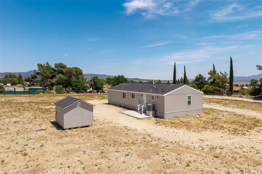 56040 Pena Road Anza, CA 92539 - Photo 31 of 42 a view of a dry yard with wooden fence