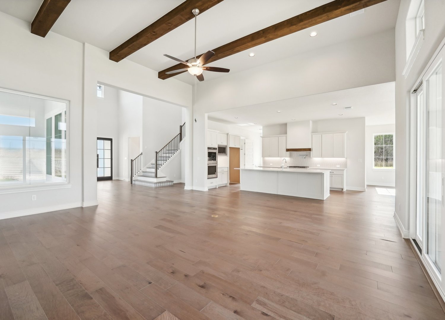 3 Bob Wire Road Spicewood, TX 78669 - Photo 10 of 27 Light and bright with large windows to let the outside in.