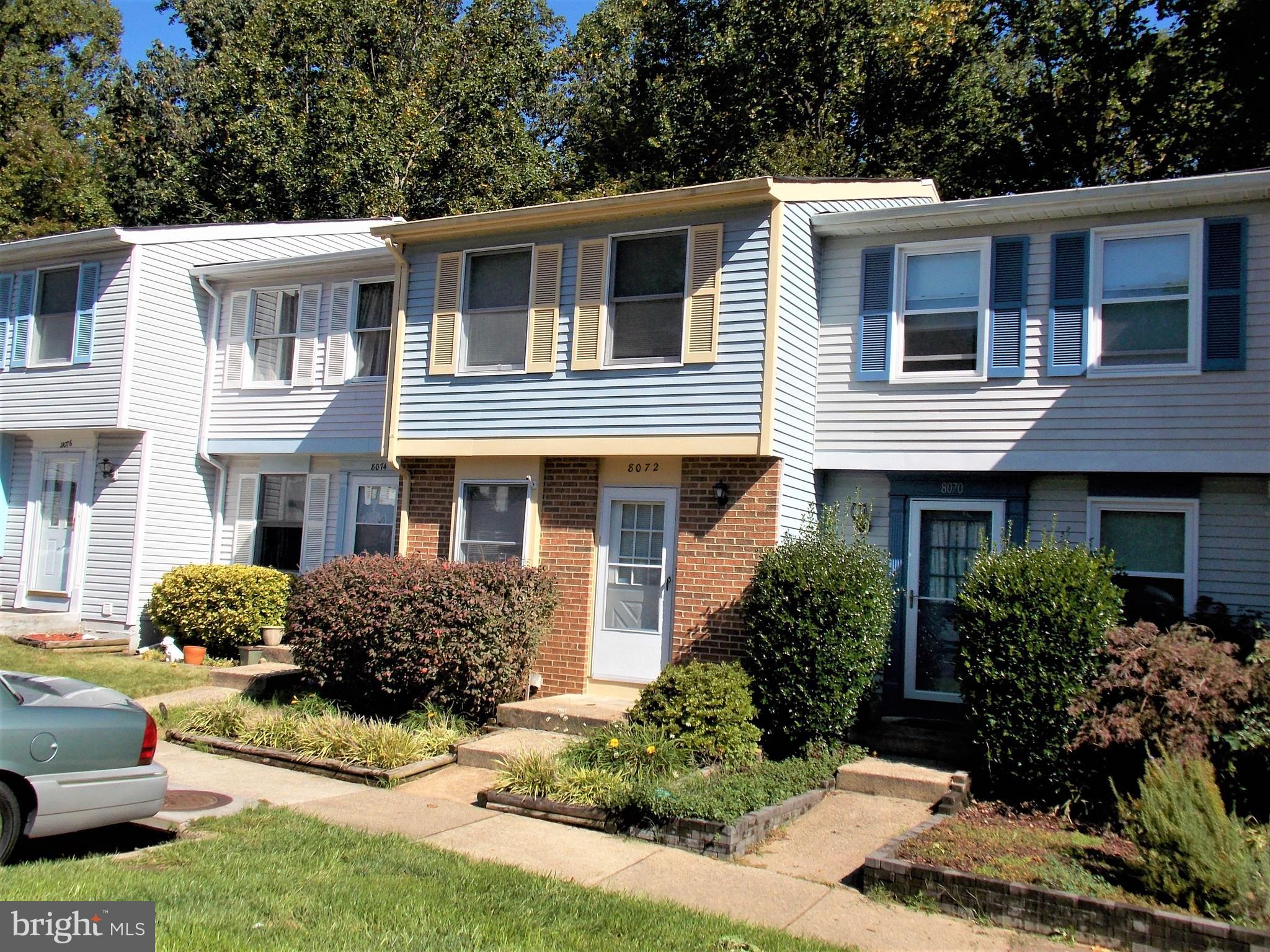 8072 Grandview Court Springfield, VA 22153 - Photo 1 of 32 a front view of a house with a yard