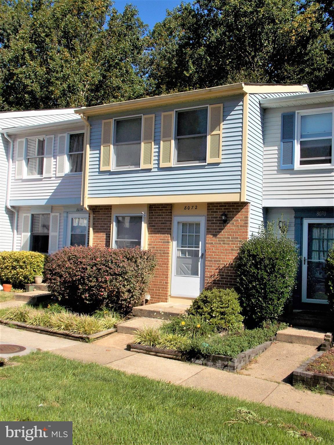 8072 Grandview Court Springfield, VA 22153 - Photo 2 of 32 a front view of a house with a yard