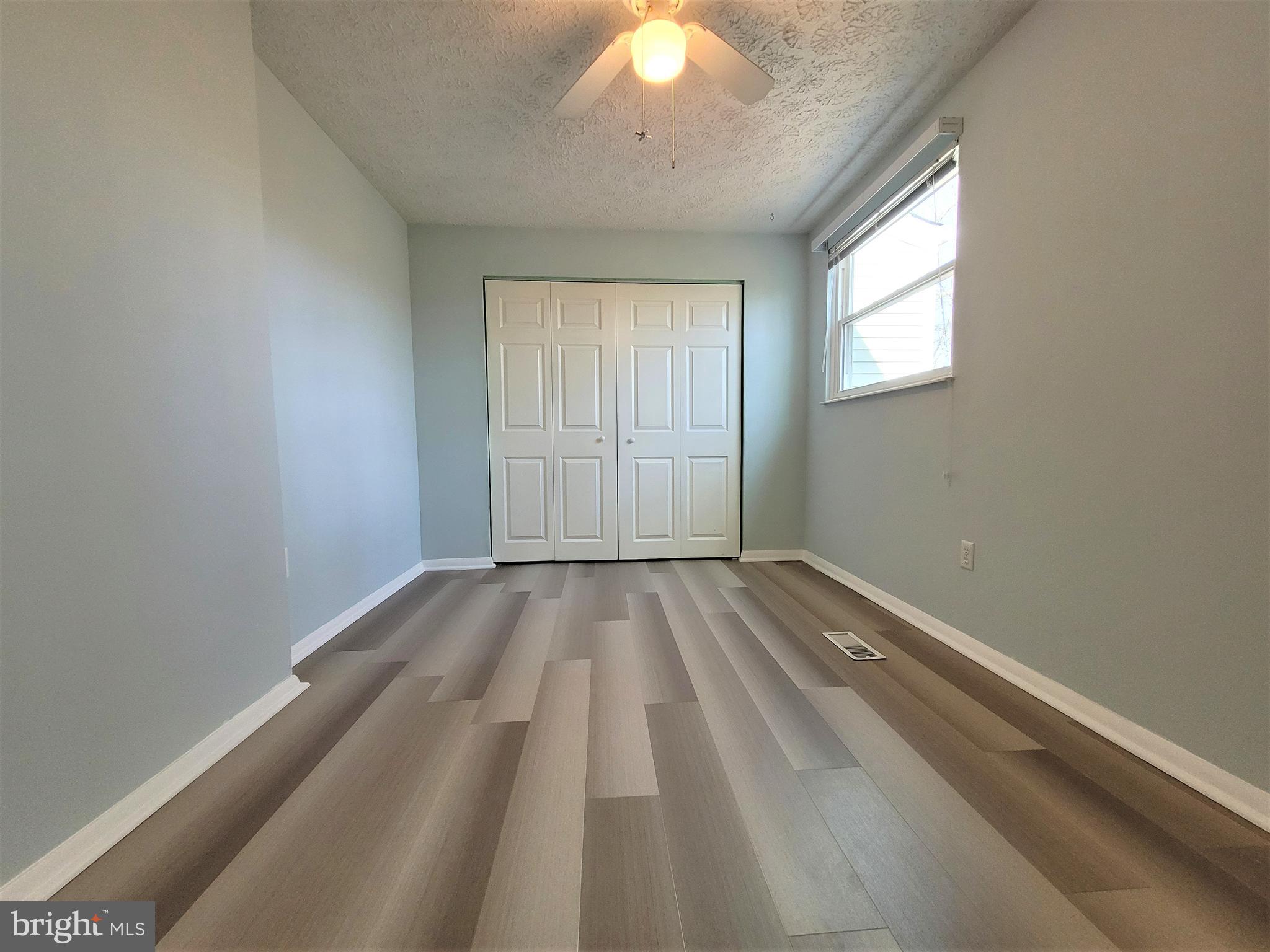 8072 Grandview Court Springfield, VA 22153 - Photo 21 of 32 an empty room with a window