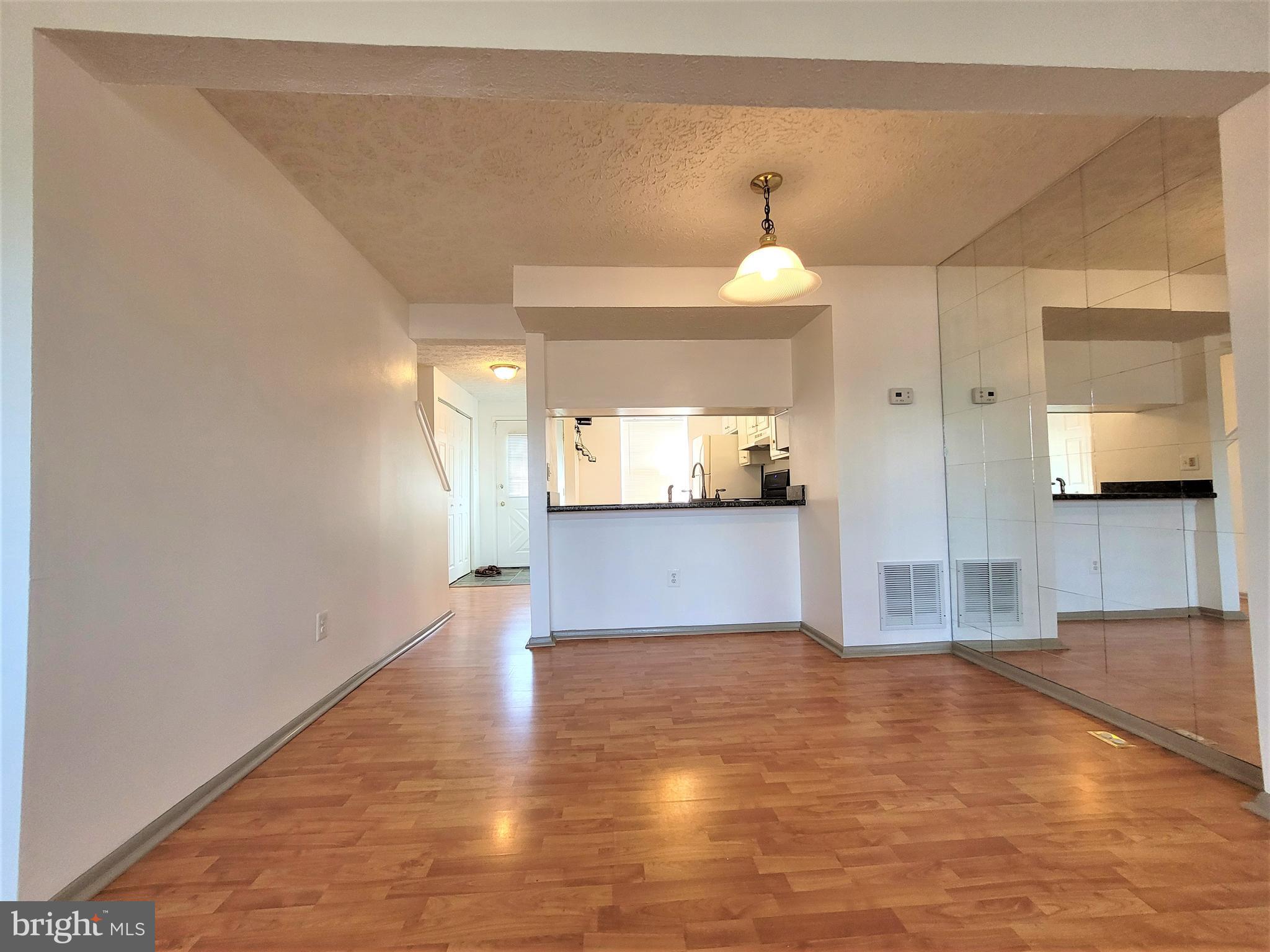 8072 Grandview Court Springfield, VA 22153 - Photo 9 of 32 a view of a kitchen and a window
