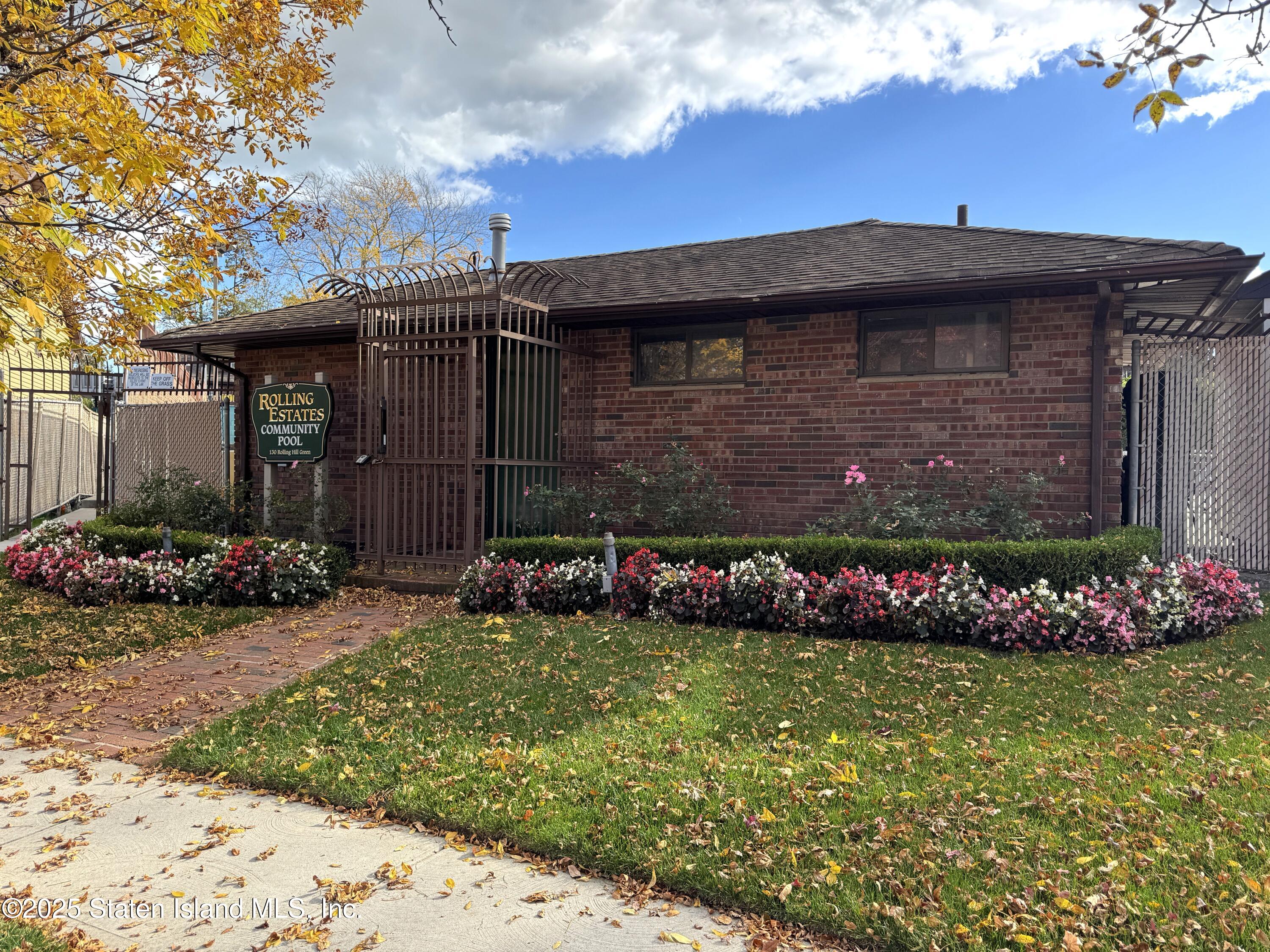 280 Rolling Hill Green Staten Island, NY 10312 - Photo 22 of 22 a view of a house with a yard