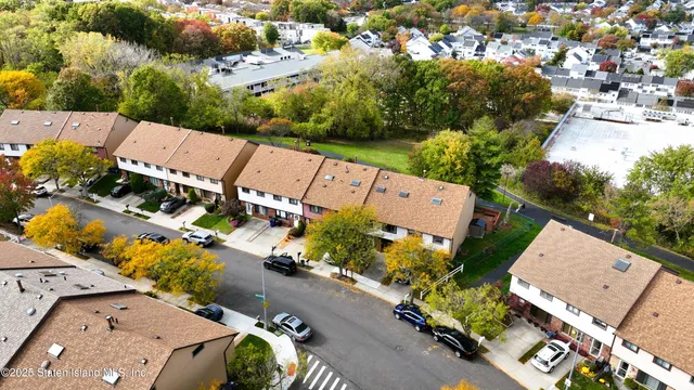 an aerial view of a house with a garden
