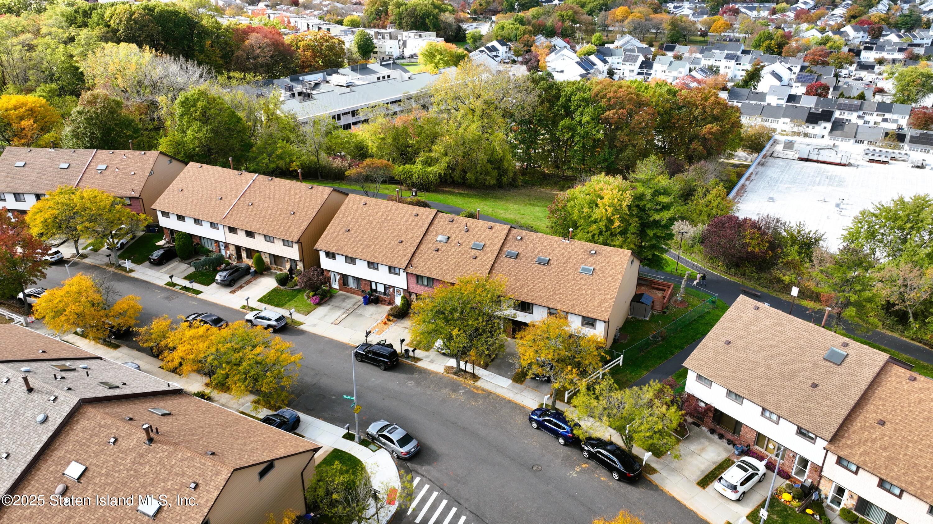 280 Rolling Hill Green Staten Island, NY 10312 - Photo 4 of 22 an aerial view of a house with a garden