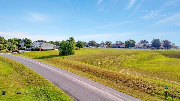 a view of an swimming pool with an ocean view