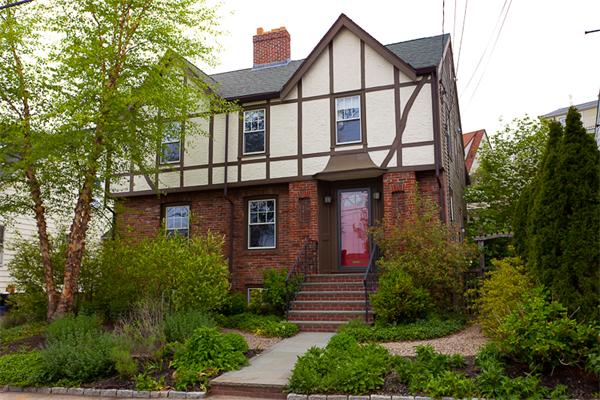 82 Cutter Hill Road Arlington, MA 02474 - Photo 1 of 14 a view of a house with brick walls and plants
