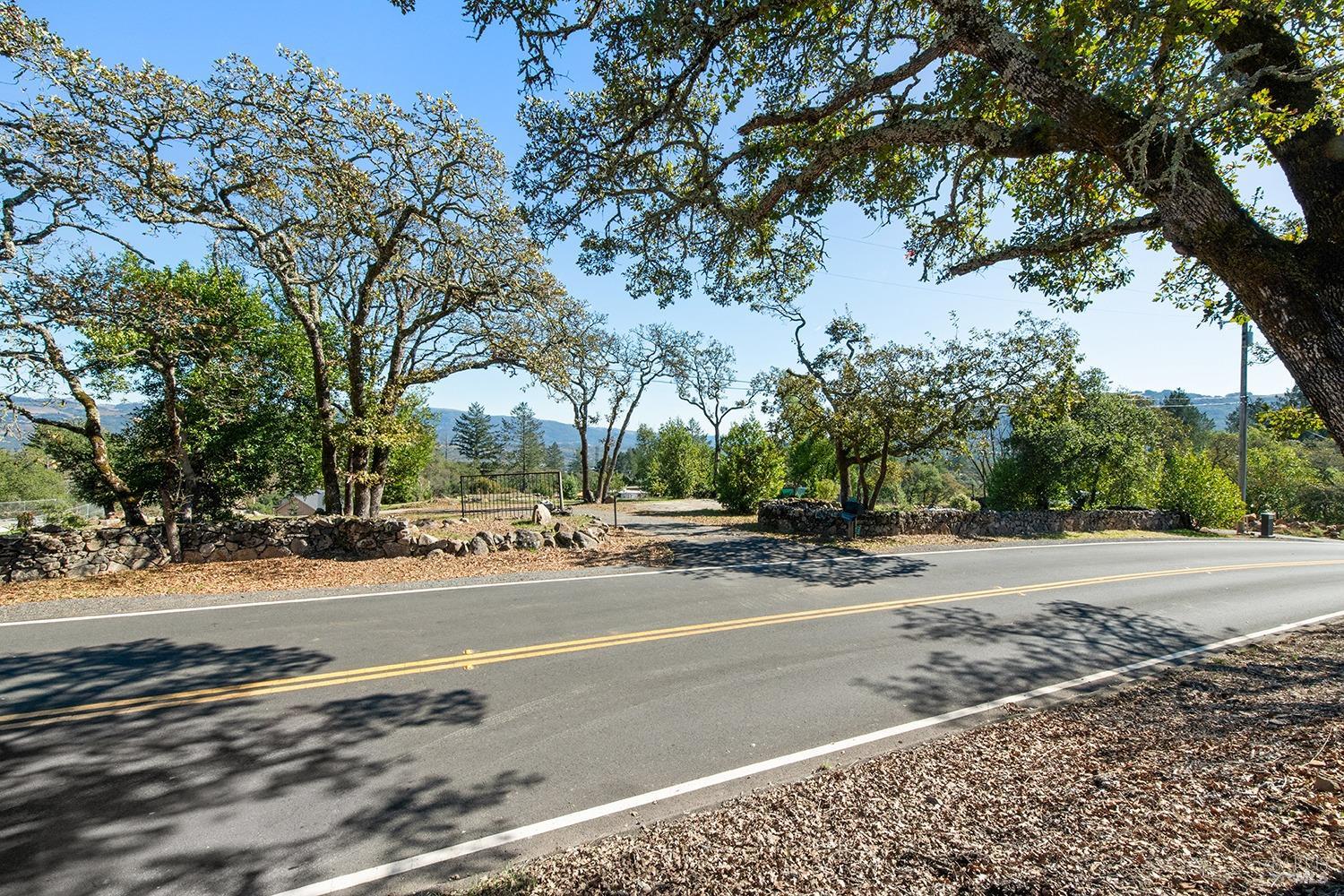 2755 Rollo Road Santa Rosa, CA 95404 - Photo 1 of 1 a view of street with a cars parked on road