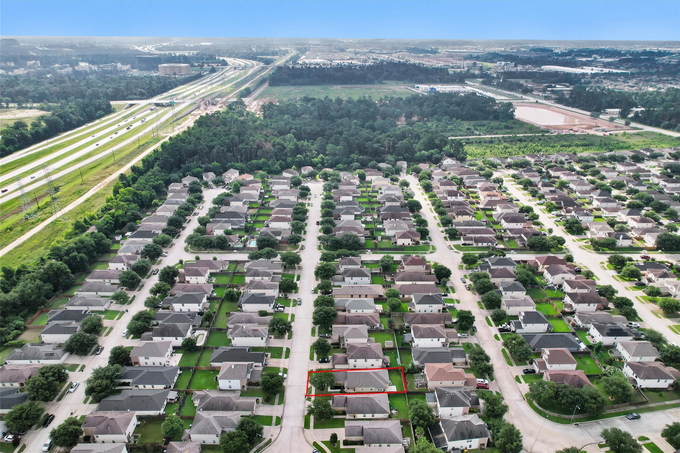 3131 Beacon Grove Street Spring, TX 77389 - Photo 38 of 38 a view of a city with tall buildings