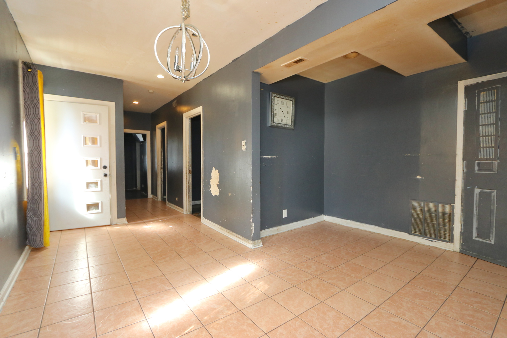727 North Springfield Avenue Chicago, IL 60624 - Photo 2 of 22 a view of a hallway with wooden floor