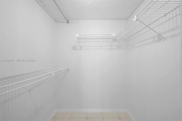 a view of a room with racks on the wall