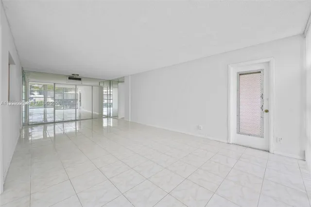 an empty room with sliding door