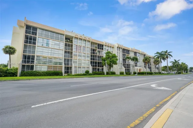 a view of a building with a street