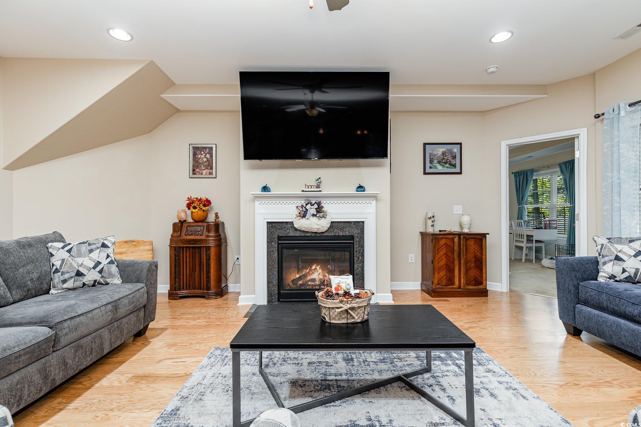 281 Marsh Tacky Loop Myrtle Beach, SC 29588 - Photo 13 of 39 Living room with wood-type flooring