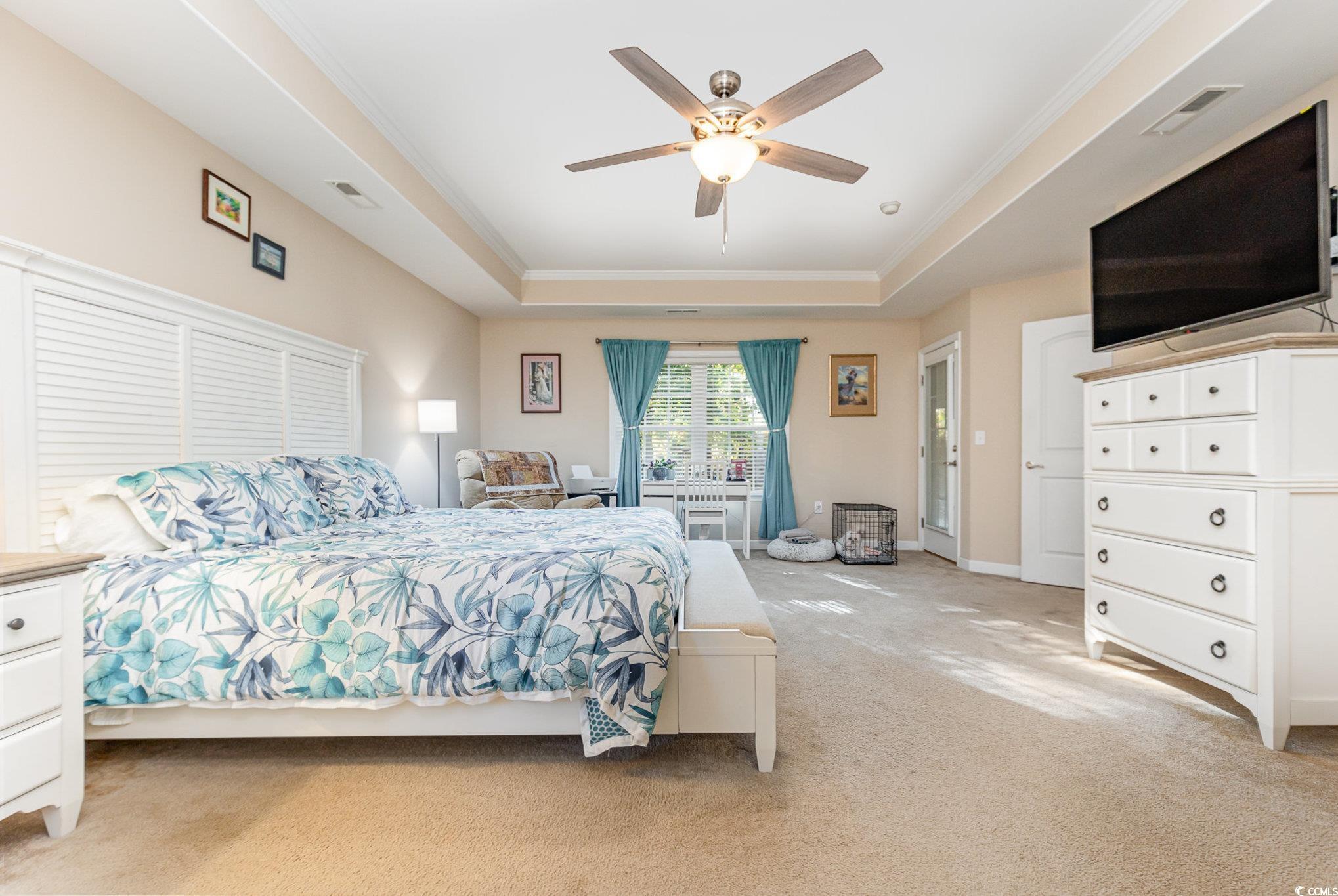 281 Marsh Tacky Loop Myrtle Beach, SC 29588 - Photo 16 of 39 Carpeted bedroom featuring crown molding, ceiling