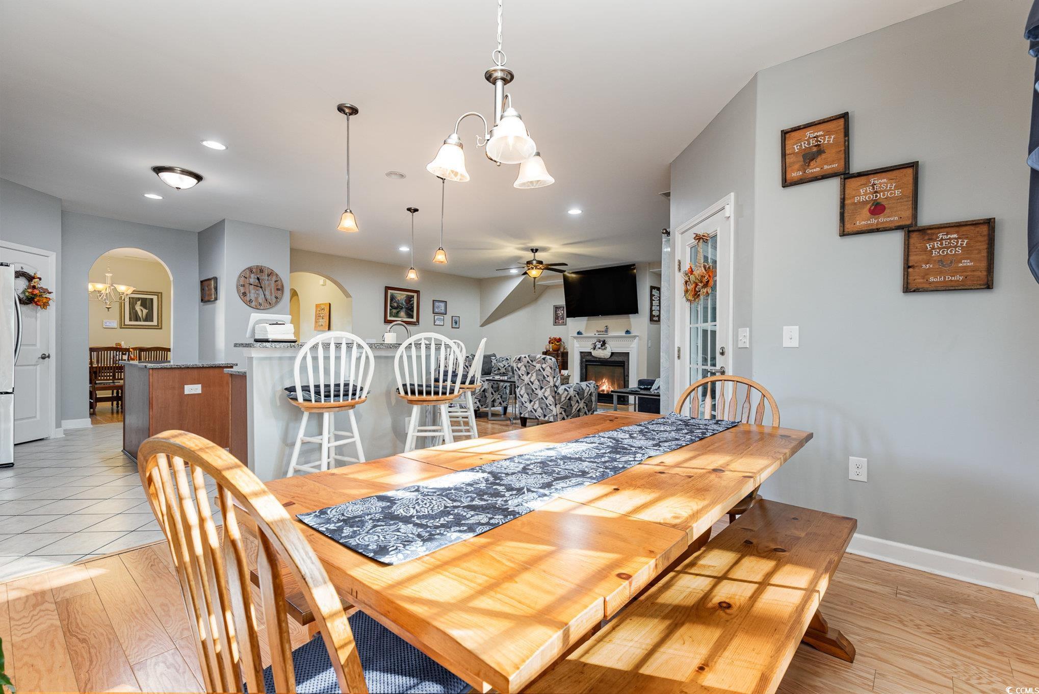 281 Marsh Tacky Loop Myrtle Beach, SC 29588 - Photo 9 of 39 Dining area featuring light hardwood / wood-style