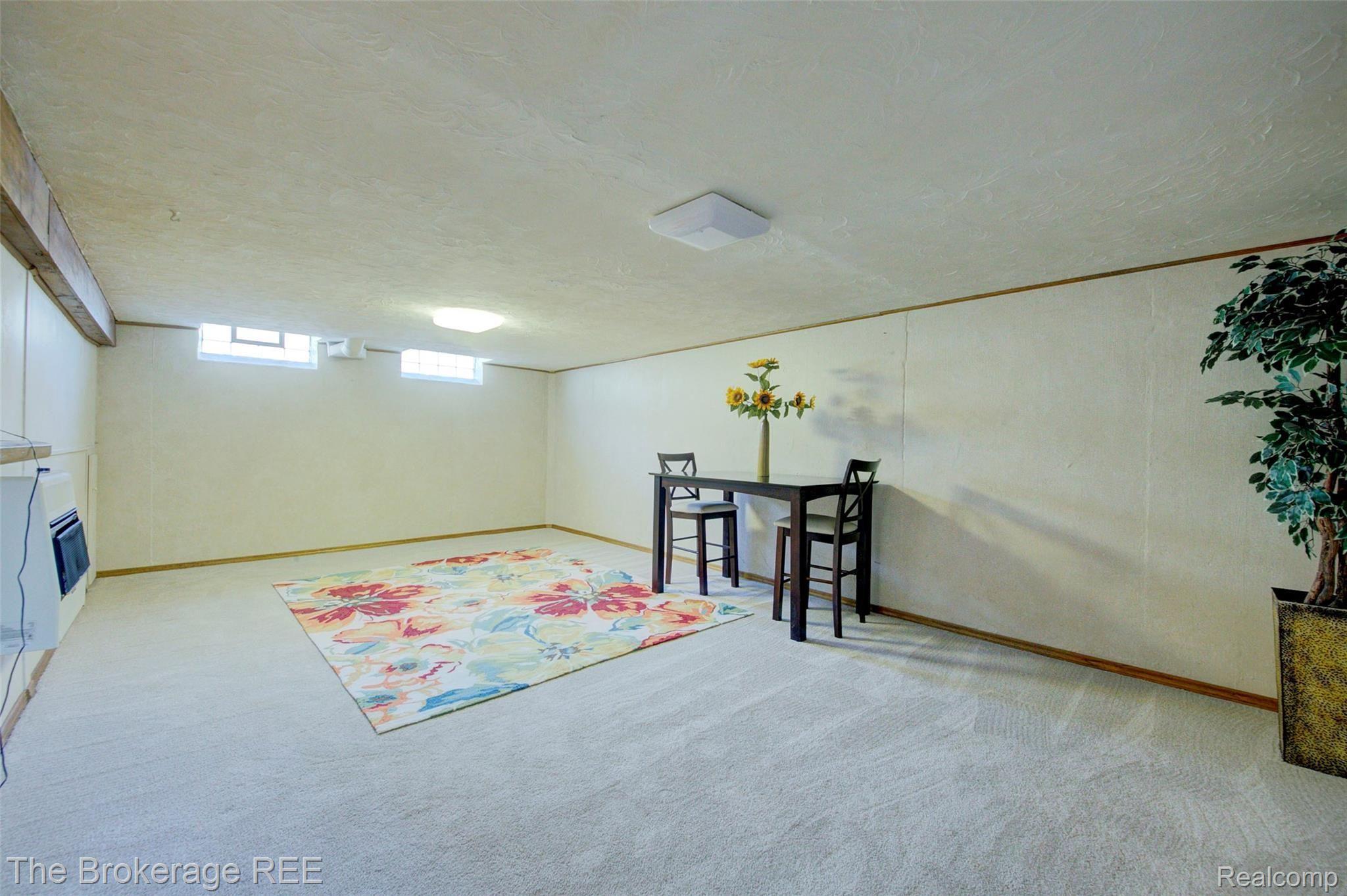340 Thalia Avenue Rochester, MI 48307 - Photo 42 of 49 Rec room with newer carpet