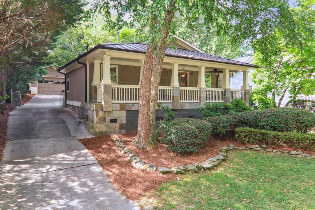 1807 Duke Road Brookhaven, GA 30341 - Photo 1 of 1 a front view of a house with garden