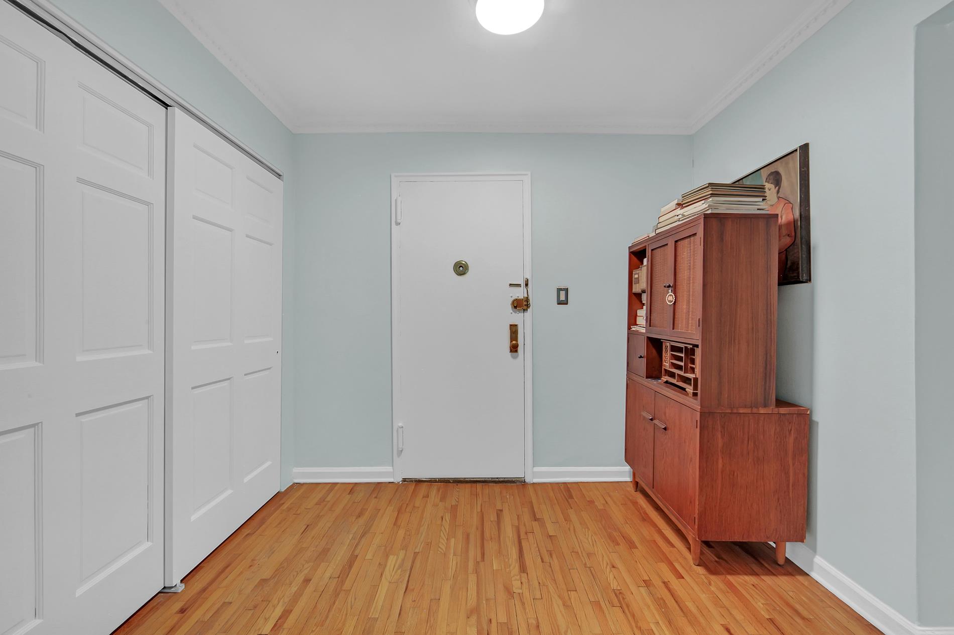 9411 Shore Road, Unit 1O Brooklyn, NY 11209 - Photo 11 of 19 a view of walk in closet with clothes and shoes