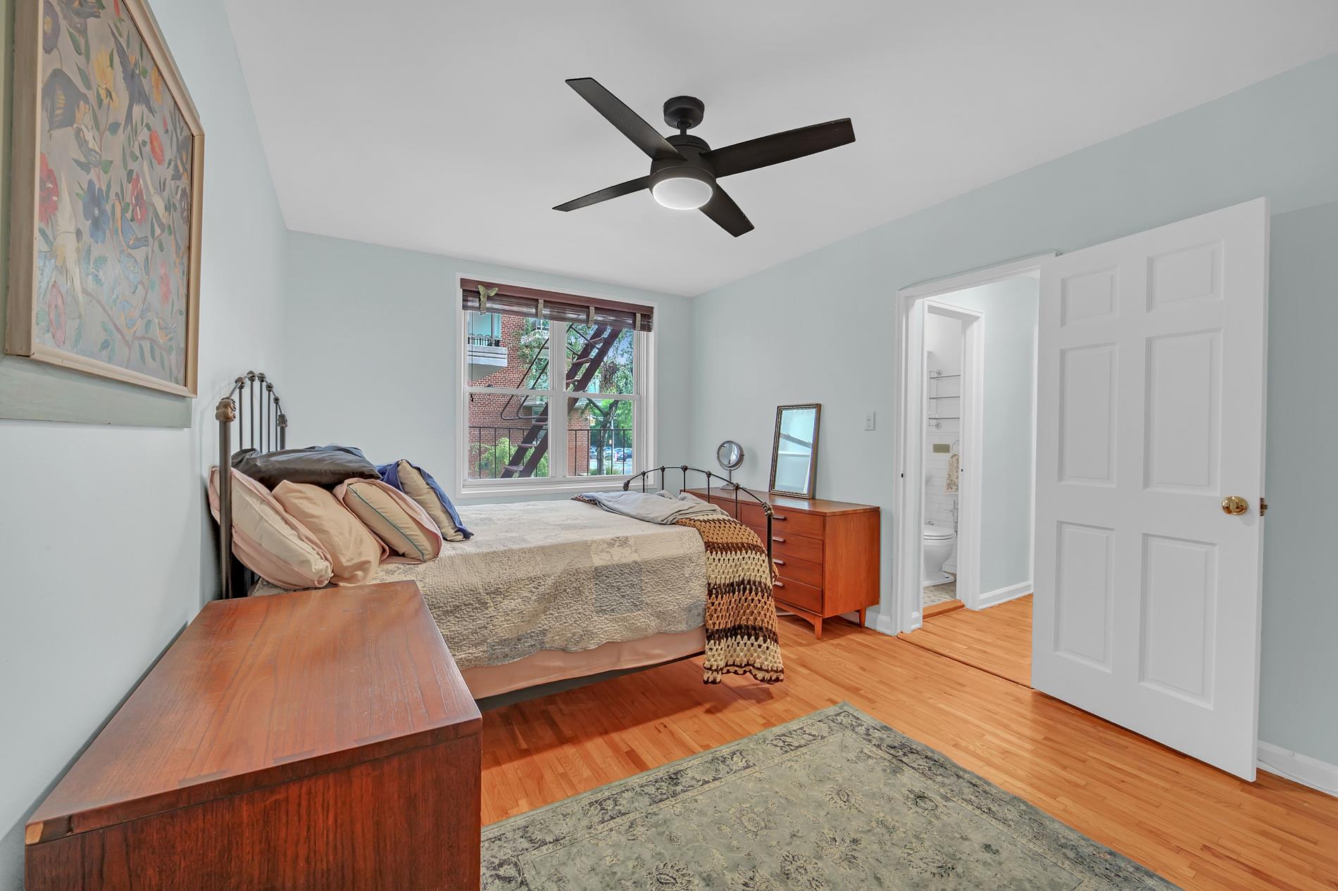 9411 Shore Road, Unit 1O Brooklyn, NY 11209 - Photo 17 of 19 a bedroom with furniture and window