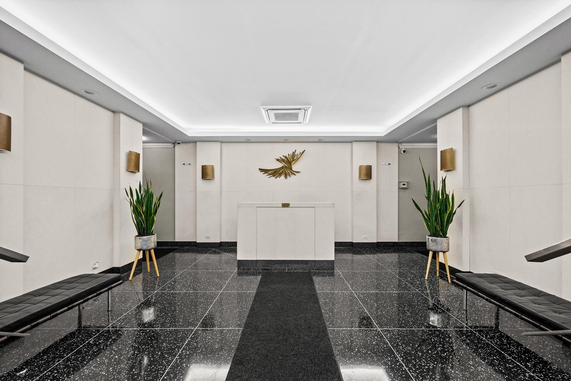 9411 Shore Road, Unit 1O Brooklyn, NY 11209 - Photo 6 of 19 a view of entryway with wooden floor