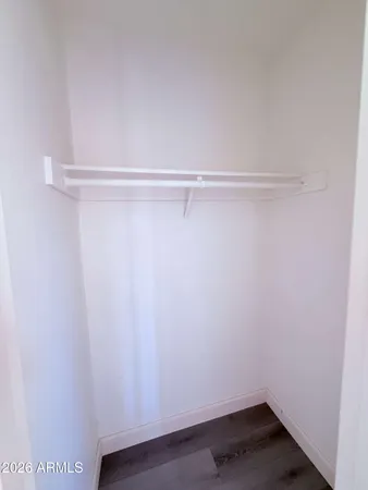 a view of an empty walk in closet