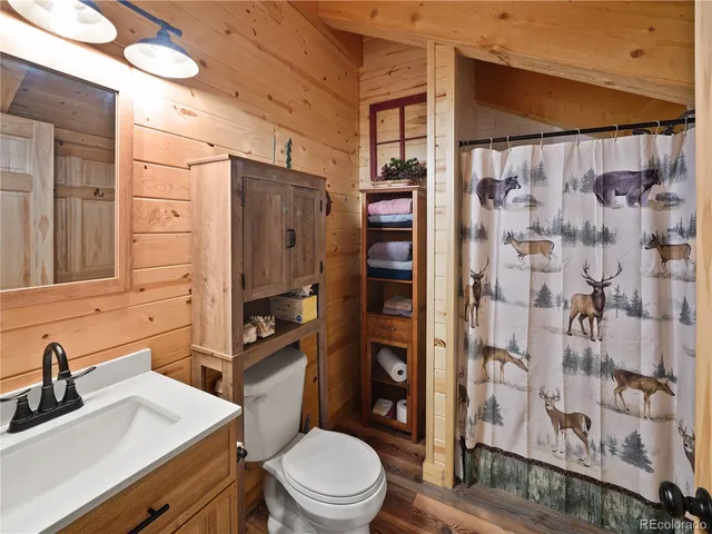 a view of a porch with wooden floor