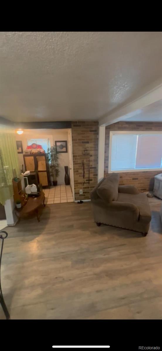 1037 South Perry Street Denver, CO 80219 - Photo 2 of 13 a view of parking area