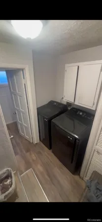 a kitchen with a sink and a stove