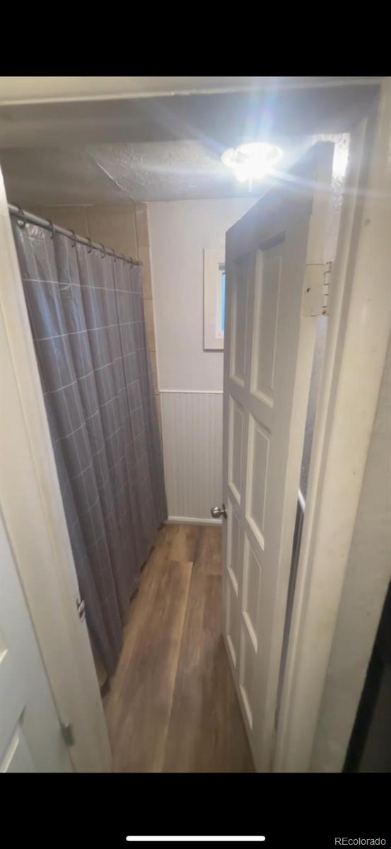 1037 South Perry Street Denver, CO 80219 - Photo 8 of 13 a view of a room