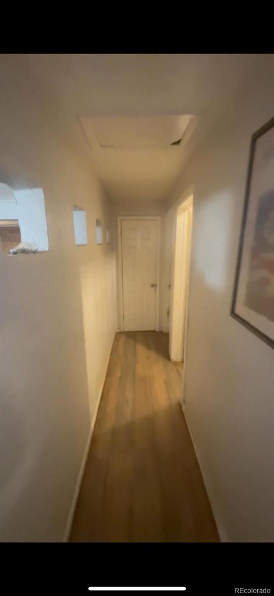 1037 South Perry Street Denver, CO 80219 - Photo 10 of 13 a view of a hallway