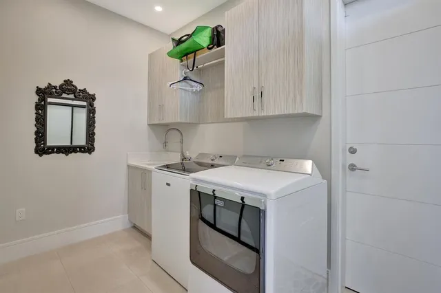 a view of swimming pool with outdoor seating and yard in the back