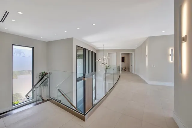 a view of a lake with houses in the back