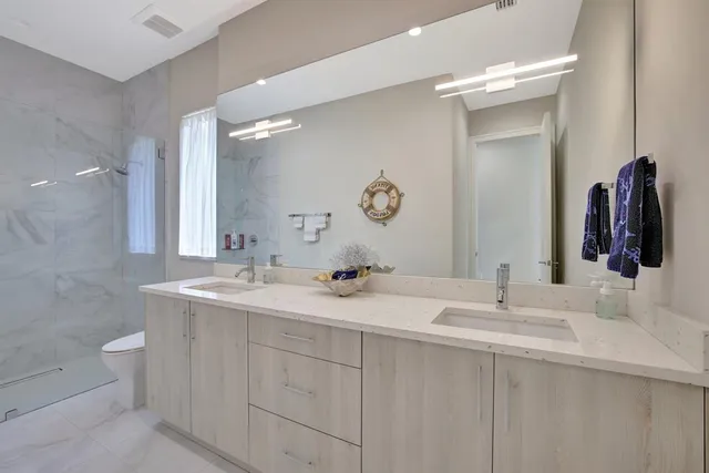 a view of a chairs and table in the patio