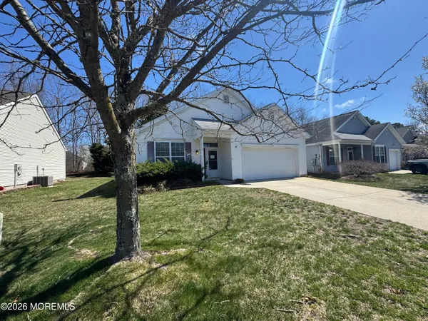 a house with trees in front of it