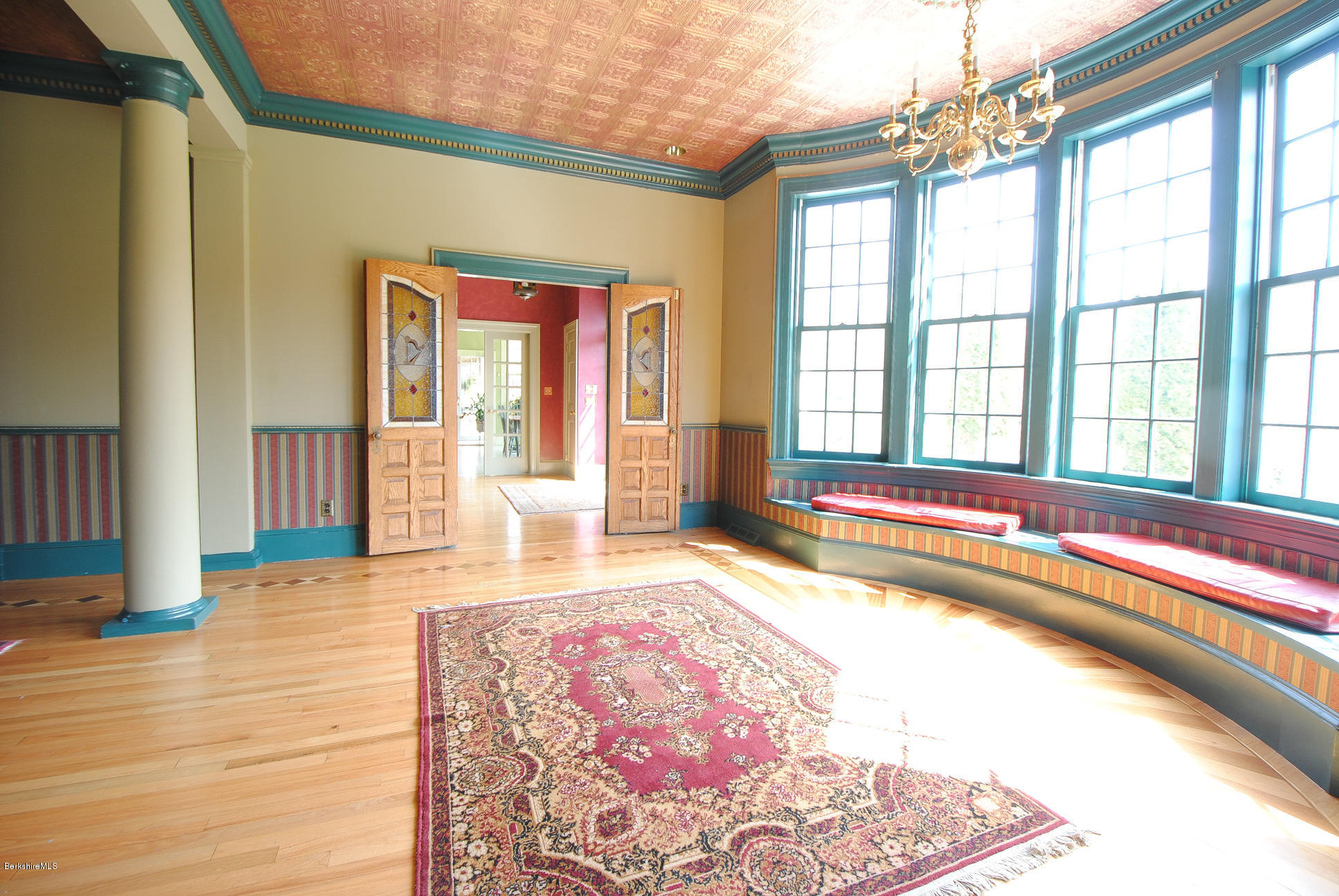 55 Maple Hill Road West Stockbridge, MA 01266 - Photo 20 of 63 a spacious bedroom with a bed and wooden floor