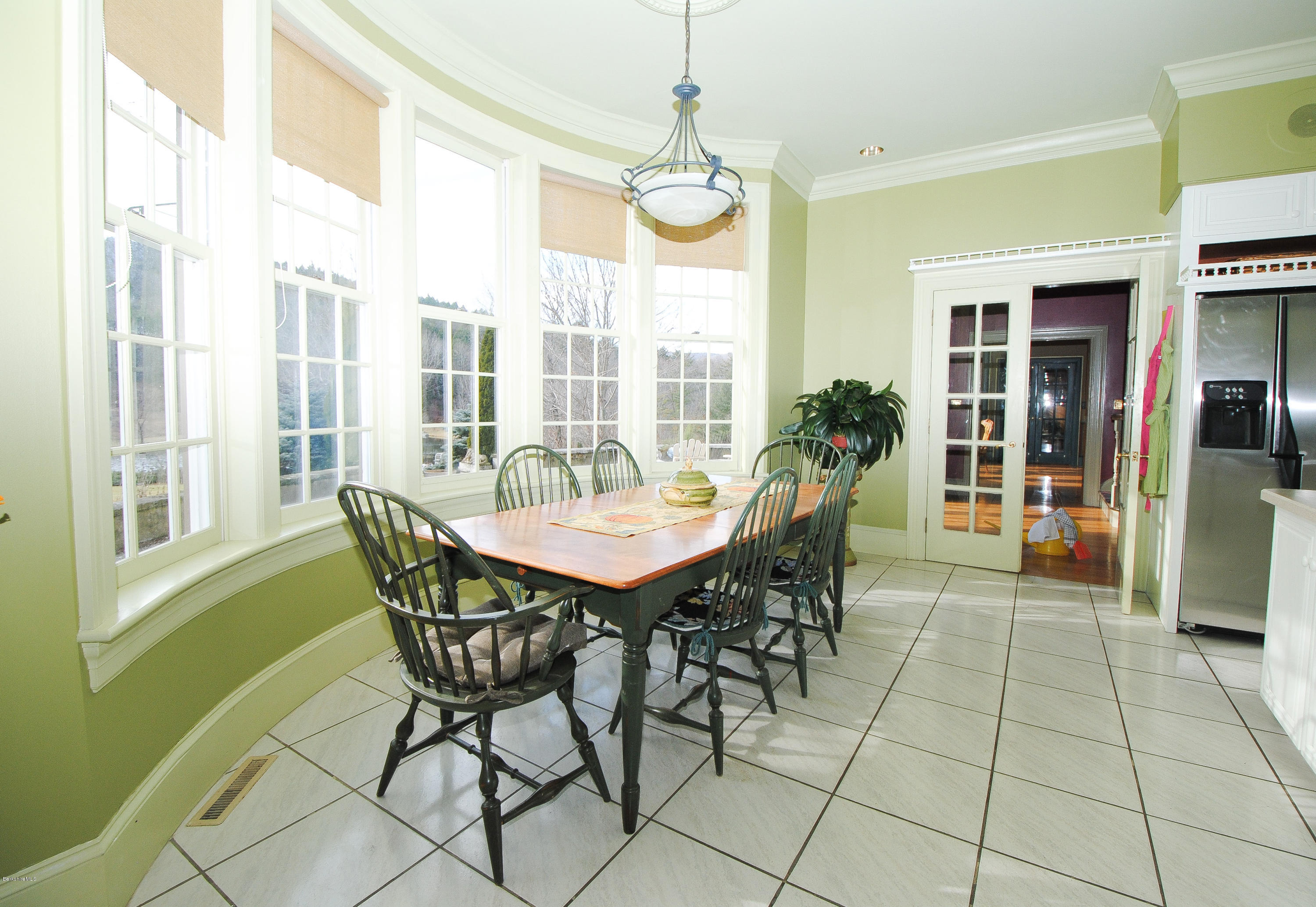 55 Maple Hill Road West Stockbridge, MA 01266 - Photo 29 of 63 a view of a dining room with furniture and a chandelier