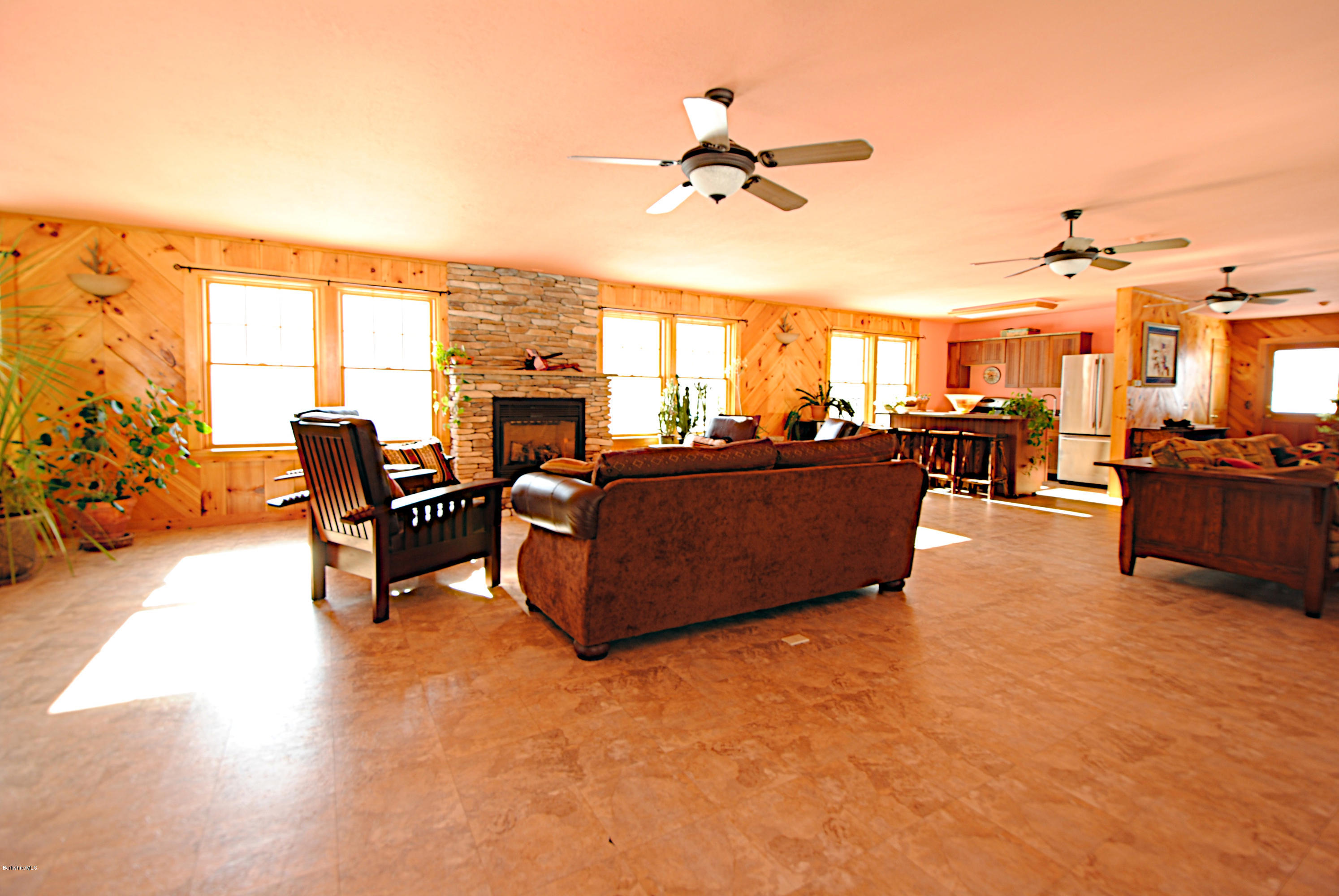 55 Maple Hill Road West Stockbridge, MA 01266 - Photo 36 of 63 a living room with furniture and a large window