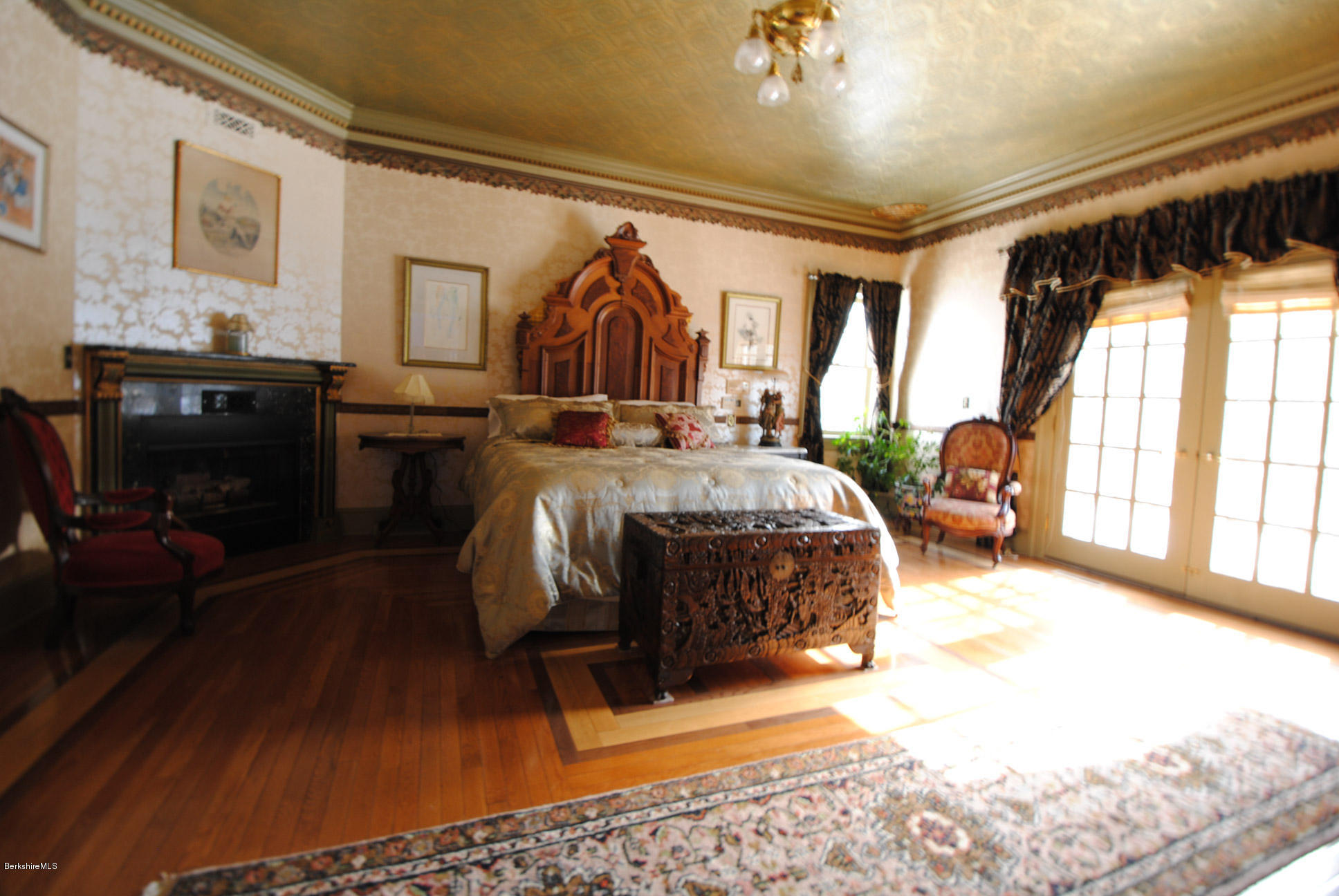 55 Maple Hill Road West Stockbridge, MA 01266 - Photo 39 of 63 a bed room with a bed and a chair